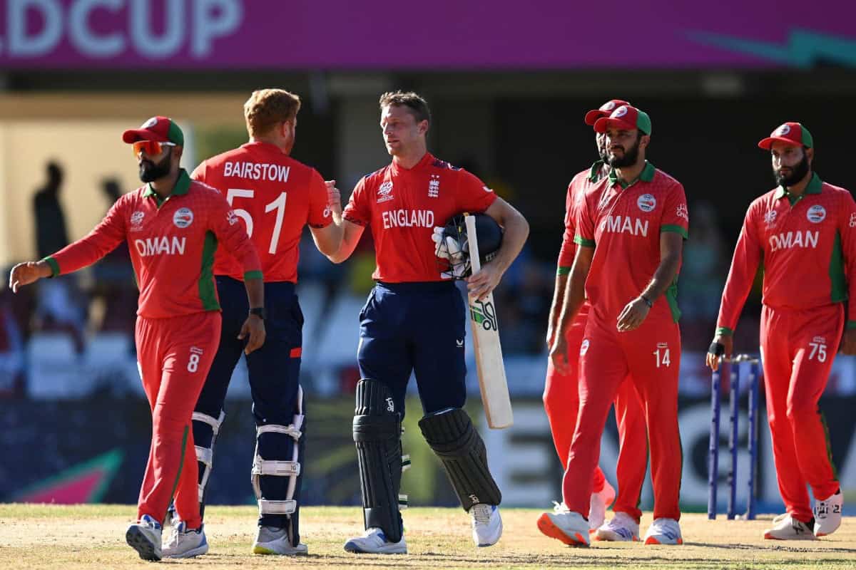 Jos Buttler and Jonny Bairstow of England celebrate victory over Oman in T20 World Cup 2024 match