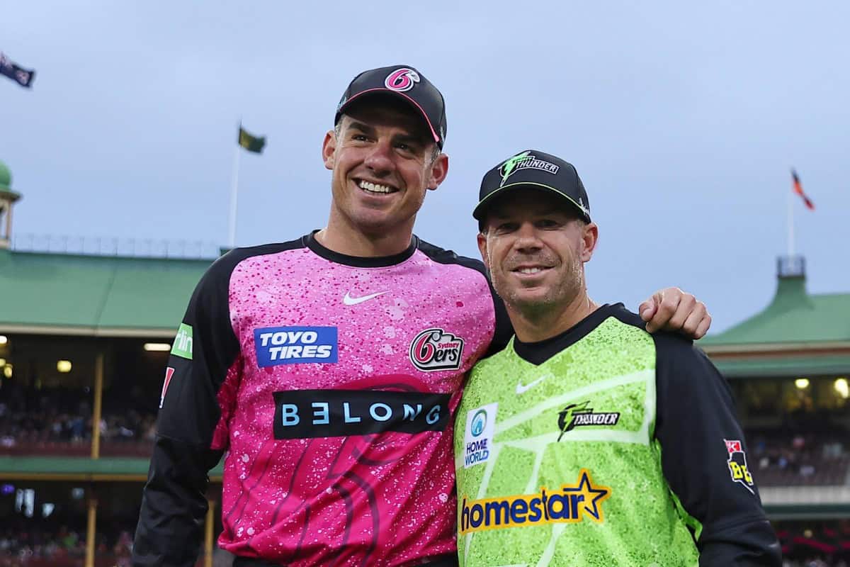 Moises Henriques of Sydney Sixers and David Warner of Sydney Thunder