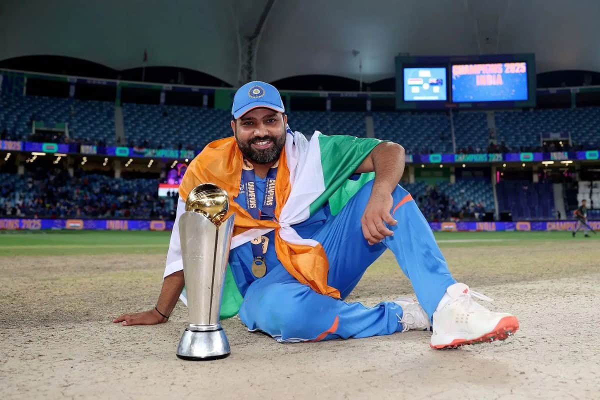 Rohit Sharma poses with the ICC Champions Trophy after winning the ICC Champions Trophy 2025 Final